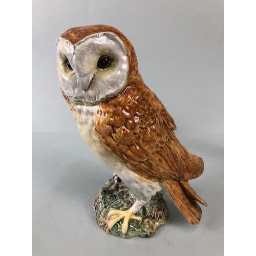 157 - Beswick, two  vintage animal figures being a Tawny Owl base stamped 1046| Beswick  England, and a Tr... 