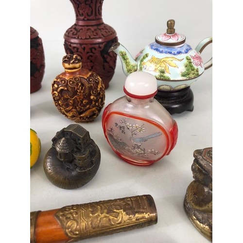 167 - Collection of oriental collectables to include Chinese snuff bottles, decorated metal tea pots, Tibe... 