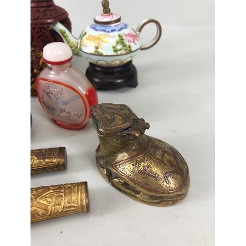 167 - Collection of oriental collectables to include Chinese snuff bottles, decorated metal tea pots, Tibe... 