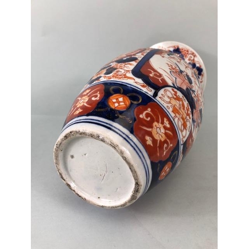 169 - Oriental ceramics, Late 18th century Japanese Imari Vase, decorated in blue and red with images of B... 