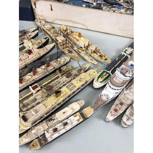 174 - Model ships, a quantity of play worn metal and plastic ship models to include Dinky, and Tri-Ang, Oc... 