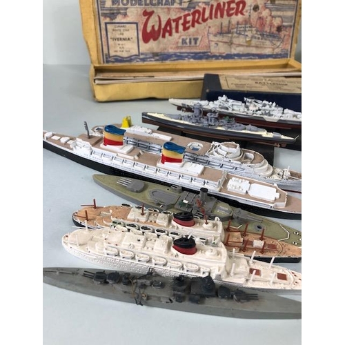 174 - Model ships, a quantity of play worn metal and plastic ship models to include Dinky, and Tri-Ang, Oc... 