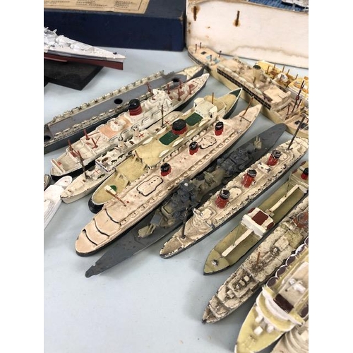 174 - Model ships, a quantity of play worn metal and plastic ship models to include Dinky, and Tri-Ang, Oc... 