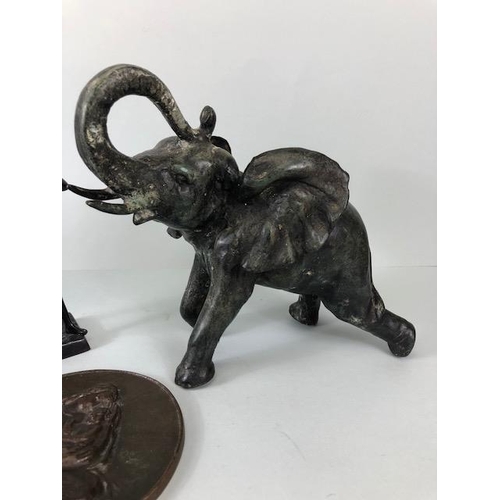 178 - Bronze sculptured, Three patinated bronze ornaments, a charging bull elephant  a classical male figu... 