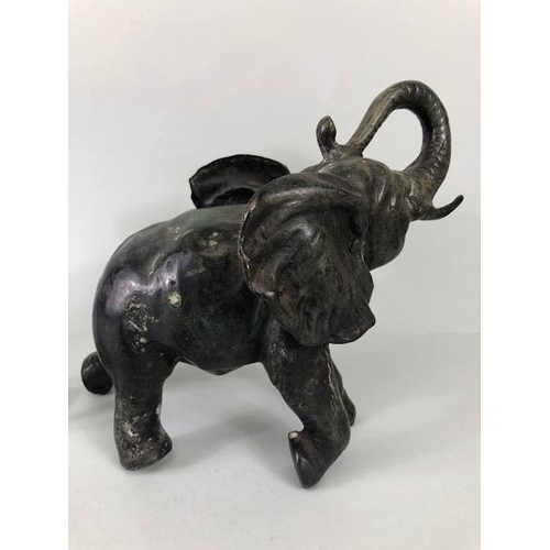 178 - Bronze sculptured, Three patinated bronze ornaments, a charging bull elephant  a classical male figu... 