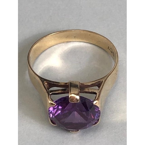 18 - 9ct Gold ring set with a Purple coloured faceted stone approx size 'M' & 3.5g