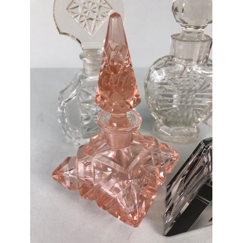 193 - Cut Glass perfume bottles, Bohemian sent bottles to include 3 in i, n clear glass one in peach and o... 