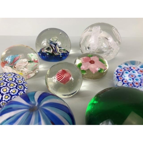 195 - Glass Paperweights, collection of Murano hand made paperweights in various colourful designs  rangin... 