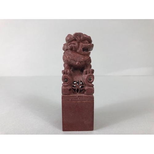 196 - Chinese carvings, a collection of  soap stone carvings to include seals bearing Foo dog and warriors... 