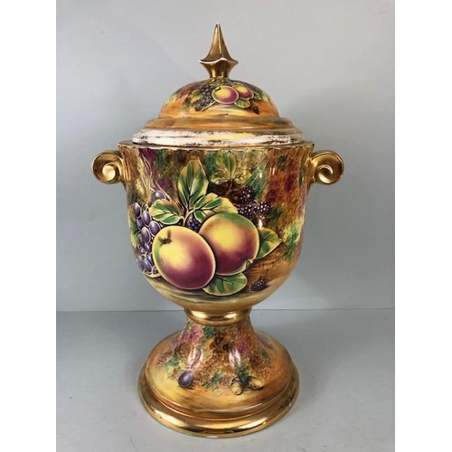 202 - Decorators interest, a Pair of Large Baroness China lidded Urns decorated with paintings of fruit an... 