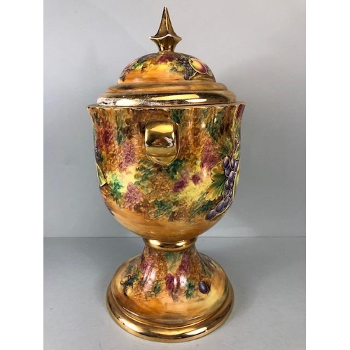 202 - Decorators interest, a Pair of Large Baroness China lidded Urns decorated with paintings of fruit an... 