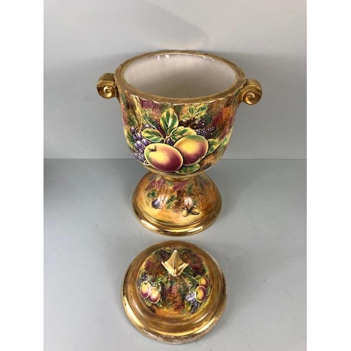 202 - Decorators interest, a Pair of Large Baroness China lidded Urns decorated with paintings of fruit an... 