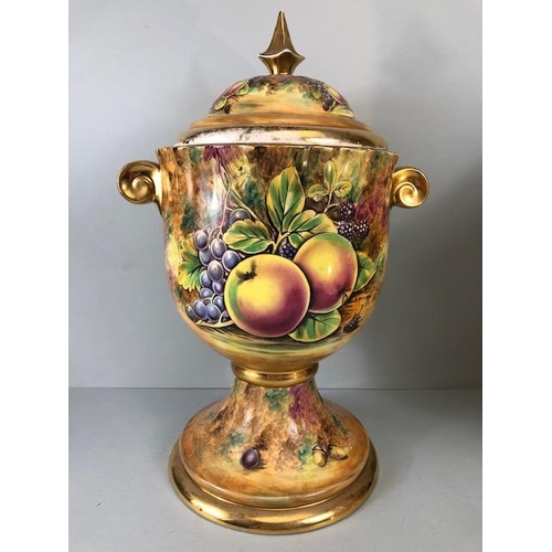202 - Decorators interest, a Pair of Large Baroness China lidded Urns decorated with paintings of fruit an... 