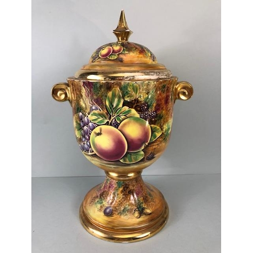 202 - Decorators interest, a Pair of Large Baroness China lidded Urns decorated with paintings of fruit an... 