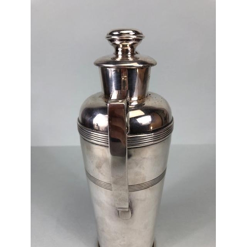 21 - Large possibly by Farrow & Jackson silver plated cocktail shaker stamped 