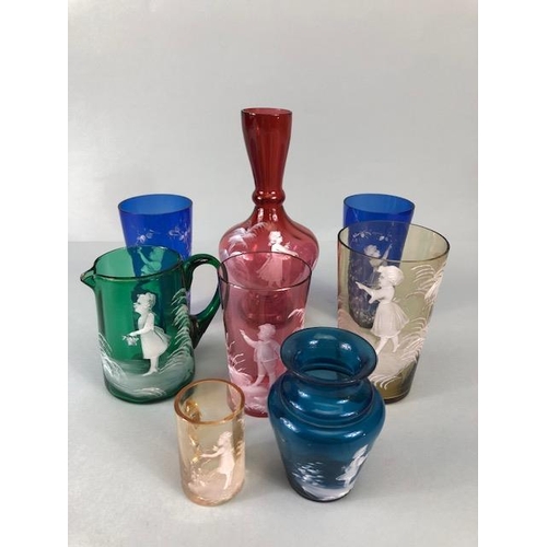 215 - Bohemian glass, a collection of  coloured cameo glass in Blue, Green, Cranberry, and amber decorated... 