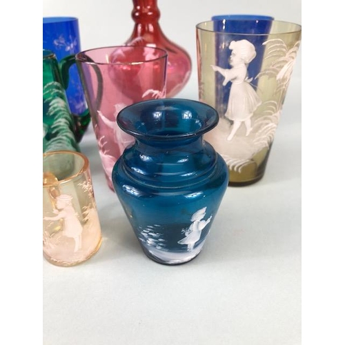 215 - Bohemian glass, a collection of  coloured cameo glass in Blue, Green, Cranberry, and amber decorated... 