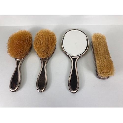 22 - Silver and Tortoise shell vanity/ dressing table brush set comprising hand held mirror and three bru... 