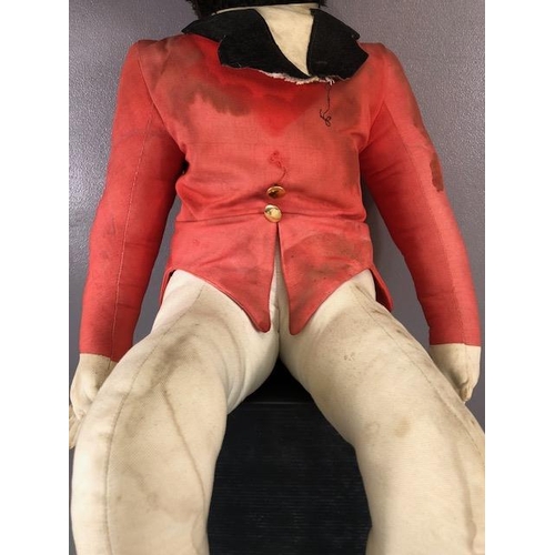 220 - Advertising Interest, Black plush seated figure of a fox dressed in hunting pinks, used in country c... 