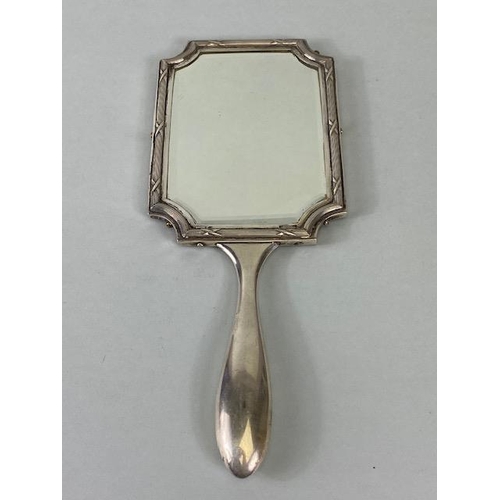 23 - Hand held Silver coloured (white metal) double sided vanity mirror with bevelled edged glass and ree... 