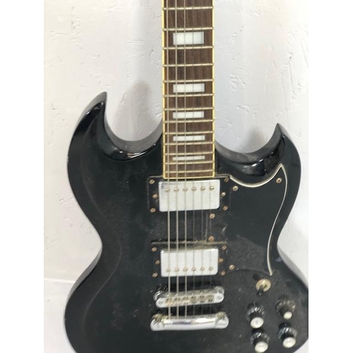 235 - Vintage Guitar. Electric Tangle wood Guitar, body with black finish, one replacement peg