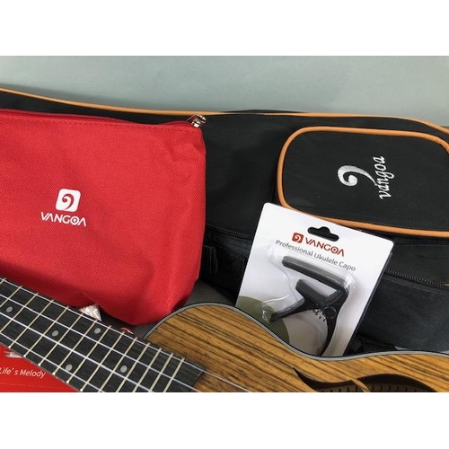 239 - Modern Ukulele, by Vango with carry case with bag of accessories , in card outer box