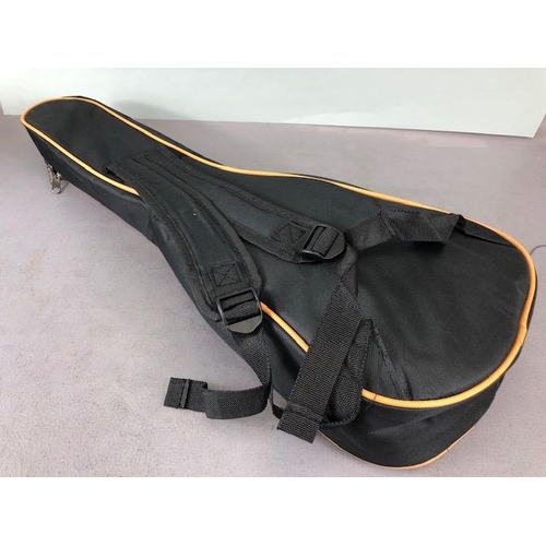 239 - Modern Ukulele, by Vango with carry case with bag of accessories , in card outer box