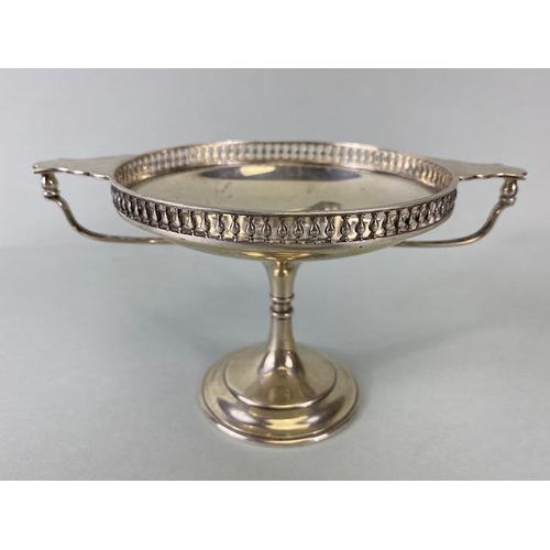 24 - Silver sweet meat dish or Tazza with twin handles and pierced edges on a stepped pedestal base Hallm... 