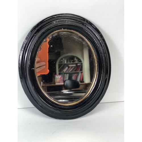 245 - Three Similar Oval Antique Black lacquered mirrors the largest approx 38cm tall