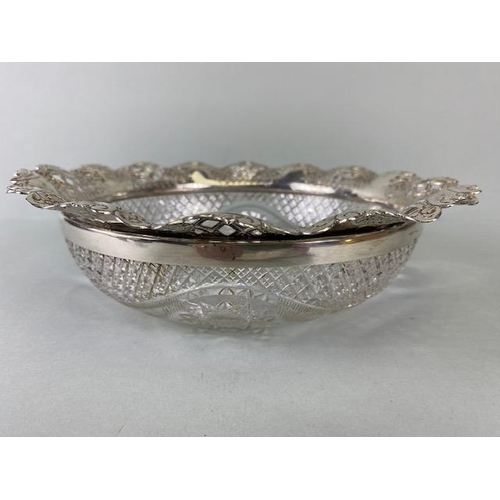 28 - Glass Bowl with ornate Hallmarked silver flared and pierced floral rim, hallmarked for Birmingham by... 