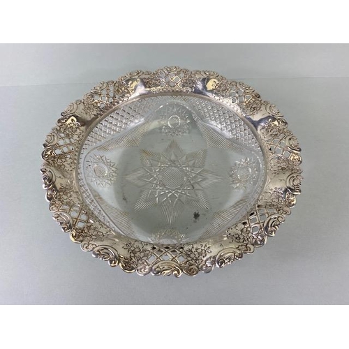 28 - Glass Bowl with ornate Hallmarked silver flared and pierced floral rim, hallmarked for Birmingham by... 