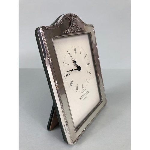 29 - Quartz Clock with cream dial Marked for Harrods of London and mounted in a silver hallmarked frame a... 