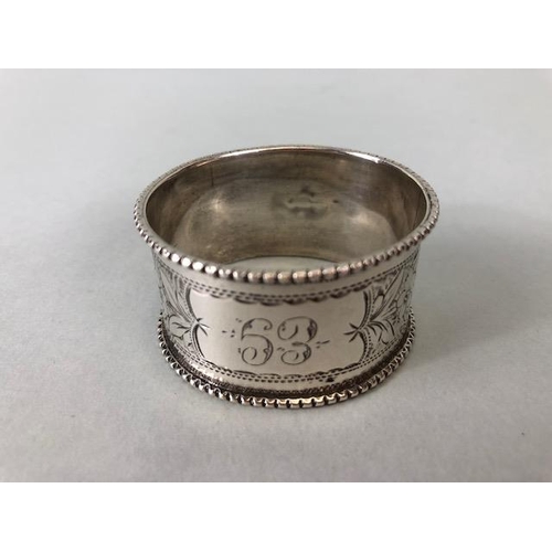 34A - Silver hallmarked lined compact and two hallmarked silver napkin rings (total weight approx60g)