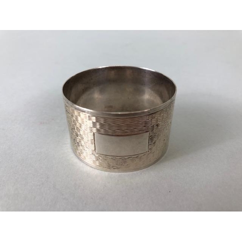 34A - Silver hallmarked lined compact and two hallmarked silver napkin rings (total weight approx60g)