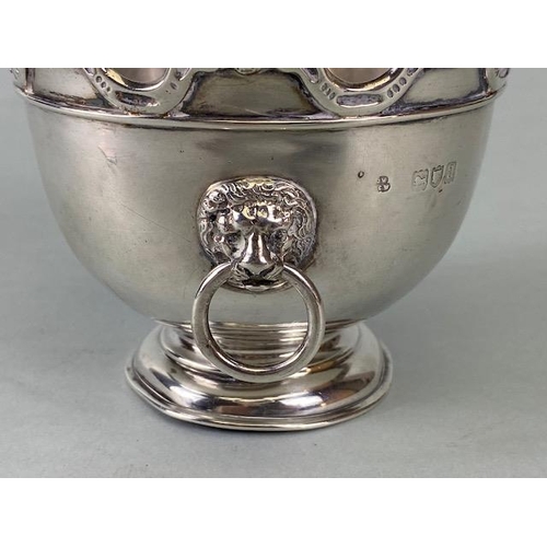 41 - Victorian Silver Hallmarked bowl with twin Lion head handles on stepped base with cherub decoration ... 