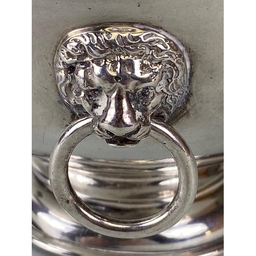 41 - Victorian Silver Hallmarked bowl with twin Lion head handles on stepped base with cherub decoration ... 