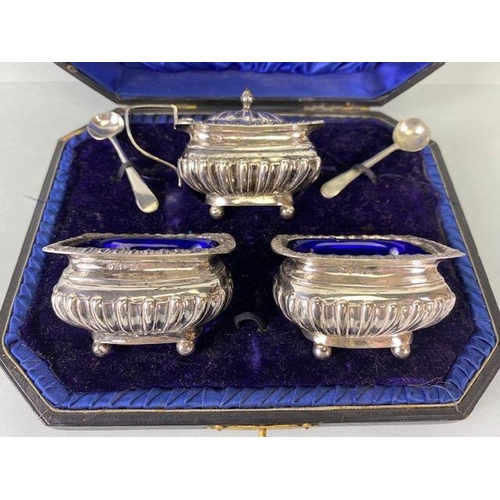 46 - Silver Hallmarked Salts with Blue glass liners and a lidded mustard pot in presentation bod with spo... 