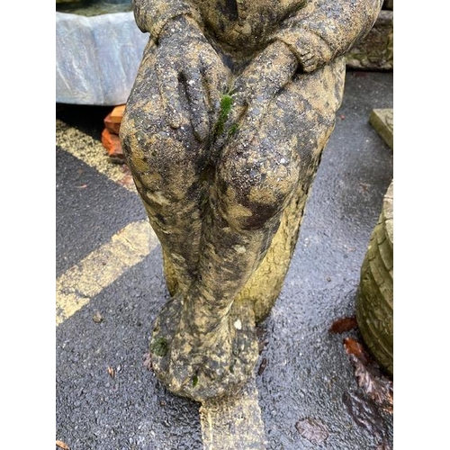 513 - Garden figure of an elf sitting on a log, approx 96cm tall