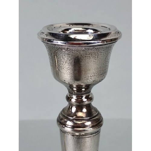 55 - A near pair of circular stepped base Silver hallmarked candlesticks by maker A T Cannon Ltd approx 1... 