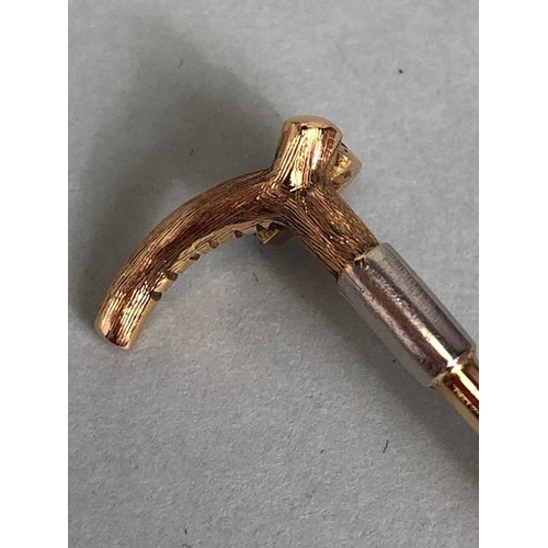 65 - 15ct Gold brooch in the form of a Horse riding Crop approx 60mm in length and total weight approx 5.... 