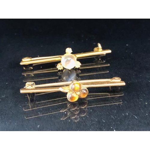 75 - Gold Jewellery, 2 bar brooches in yellow gold one stamped 756 set with a round moonstone and 3 diamo... 