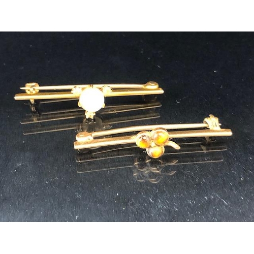 75 - Gold Jewellery, 2 bar brooches in yellow gold one stamped 756 set with a round moonstone and 3 diamo... 