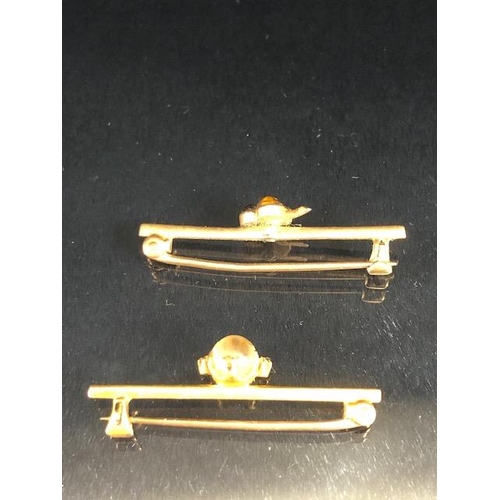 75 - Gold Jewellery, 2 bar brooches in yellow gold one stamped 756 set with a round moonstone and 3 diamo... 