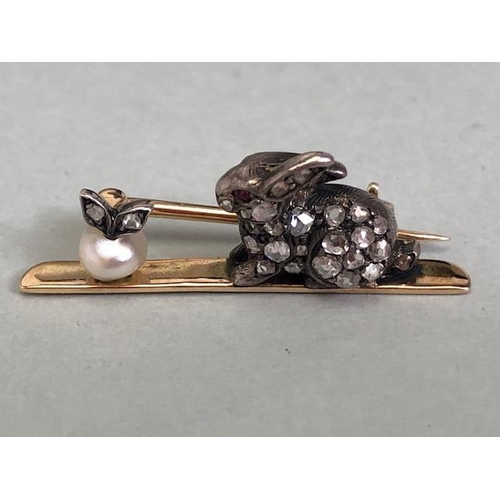 77 - Yellow metal bar brooch mounted with a white metal diamond set rabbit staring at a pearl apple appro... 