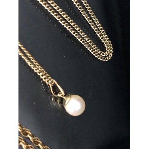 88 - Two 9ct Gold necklaces one with a pearl drop pendant each approx 55cm long and total weight approx 1... 