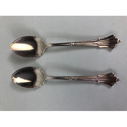 9 - Pair of Edwardian Silver hallmarked and cased spoons, hallmarked for Sheffield 1905 by maker James D... 