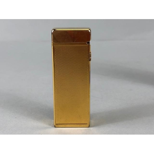 93 - Dunhill, Vintage Gold Plated Dunhill Rollagas Lighter, flip top engraved with initials and a spare e... 