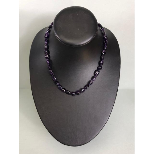 95 - Necklace of Amethyst pebble style stones approx 44cm in length