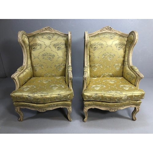 347 - Antique furniture, pair of reproduction French Rococo style wing back arm chairs upholstered in pale... 