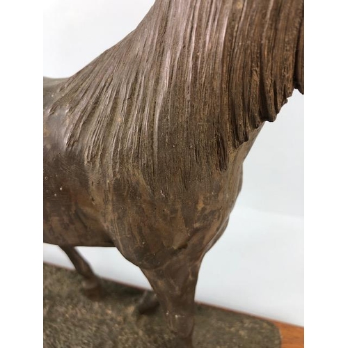 105 - Vintage Bronze finish cold cast metal statue of a horse on a wooden plinth, approximately 26 cm high